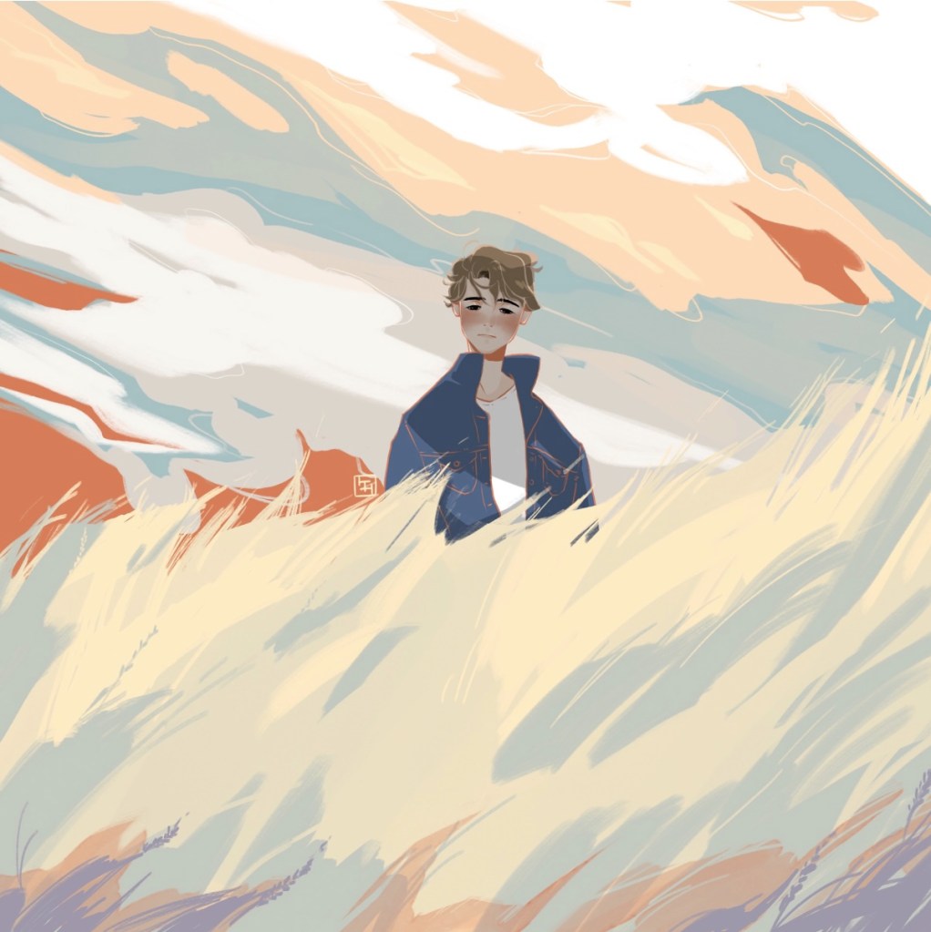 Ein Junge steht im hohen Gras.